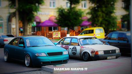 Stylish Audi and Classic Car Encounter in Cherkassy wallpaper