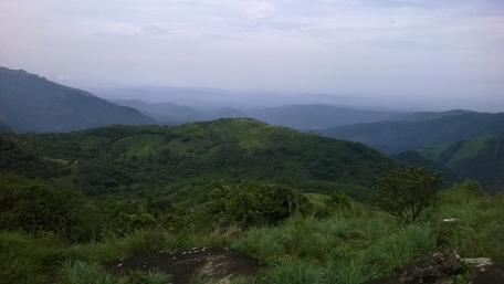 Serene Mountain Landscape with Lush Greenery wallpaper
