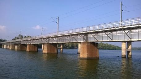Tranquil River Bridge Amidst Nature's Beauty wallpaper