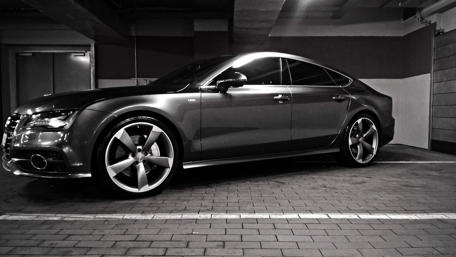 Sleek and Stylish Car in Parking Garage wallpaper