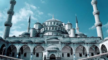 Glorious Islamic Architecture Beneath Cosmic Skies wallpaper