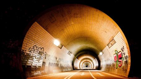 Urban Tunnel at Night with Graffiti wallpaper