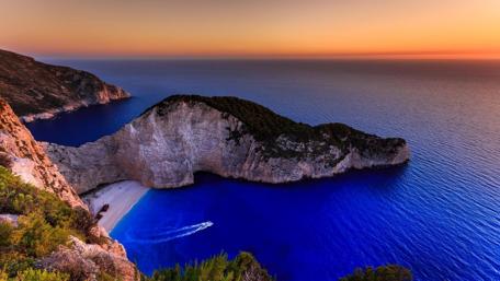 Sunset Over Serene Beach Bay wallpaper