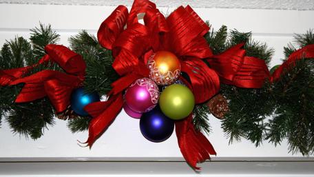 Festive Joyful Garland Decorated with Ornaments wallpaper