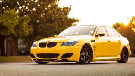 Vibrant Yellow BMW on the Streets wallpaper