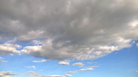 Serene Blue Sky with Dramatic Clouds wallpaper