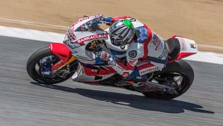 Thrilling Motorcycle Race Action Wallpaper wallpaper