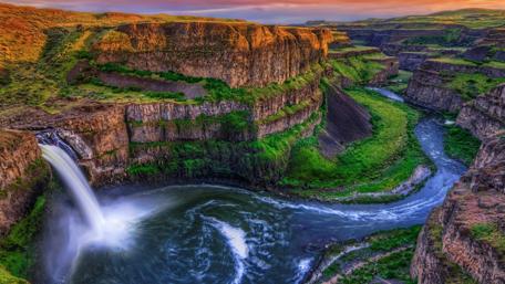 Majestic Waterfall in Lush Canyon Scenery wallpaper