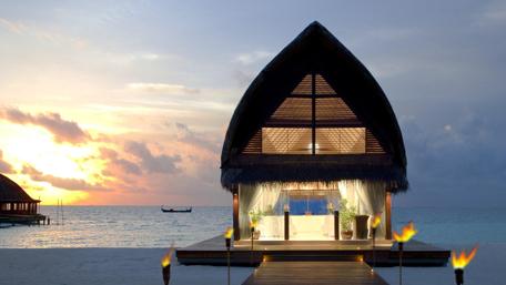 Romantic Seaside Hut at Sunset wallpaper