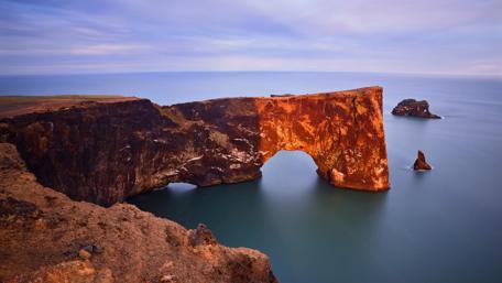 Majestic Coastal Arch at Sunset wallpaper