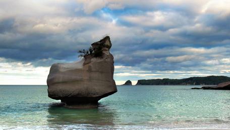 Majestic Stone by the Serene Sea wallpaper