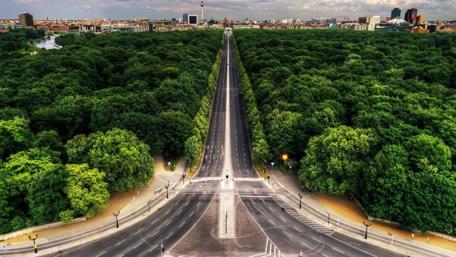 Aerial View of Urban Serenity Amidst Lush Greenery wallpaper