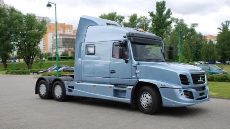 Sleek Blue Truck in Urban Setting wallpaper