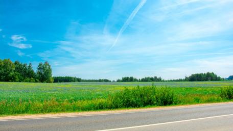 Vast Blue Sky Over Green Fields wallpaper