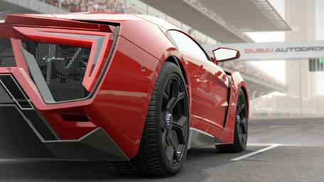 Sleek Red Supercar at Dubai Autodrome wallpaper