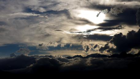 Majestic Mountain Landscape Under Dramatic Sky wallpaper
