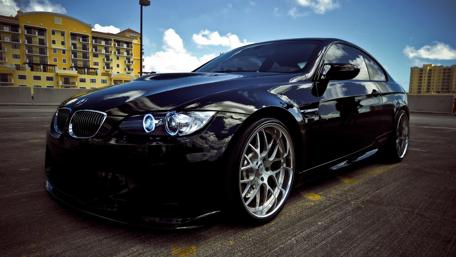 Sleek Black BMW Coupe Wallpaper wallpaper
