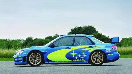 Dynamic Subaru Rally Car Wallpaper for Enthusiasts wallpaper