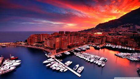 Stunning Sunset Over a City Marina wallpaper