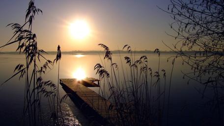 Serene Sunset Over Tranquil Waters wallpaper
