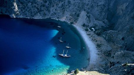Serene Blue Cove with Sailing Boats wallpaper