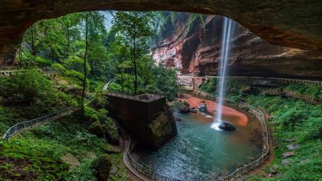 Hidden Oasis with Majestic Waterfall wallpaper