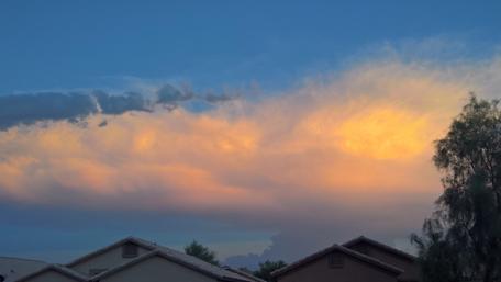Serene Sunset Over Rooftops and Sky View wallpaper