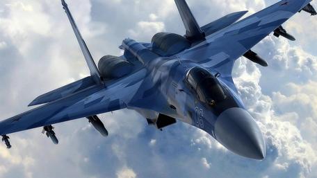 Soaring Combat Jet Amongst Clouds wallpaper