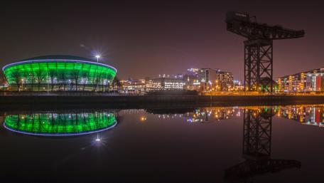 Glasgow's Vibrant Nightscape Reflection in the Clyde River wallpaper