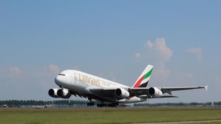 Majestic Emirates A380 in Flight Displaying Power and Elegance wallpaper