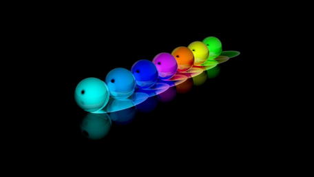 Vibrant Spheres in Motion wallpaper