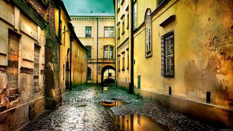 Misty Cobblestone Alley in an Empty City wallpaper