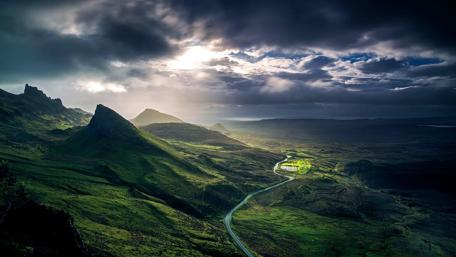 Path Through Serene Hills and Dramatic Skies wallpaper