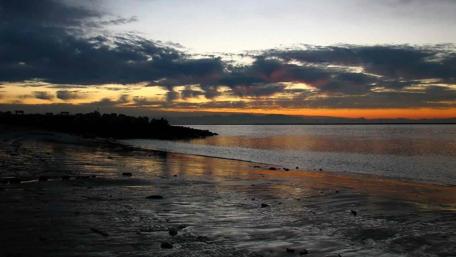 Serene Sunset Over Calm Waters wallpaper
