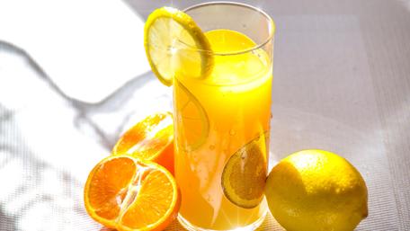 Refreshing Citrus Juice in Bright Light wallpaper