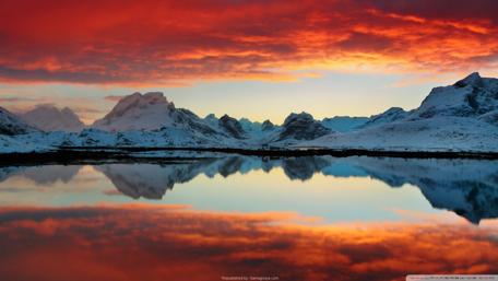 Majestic Sunset Over Snowy Mountains wallpaper