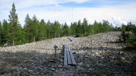 Tranquil Path Through a Rocky Landscape wallpaper