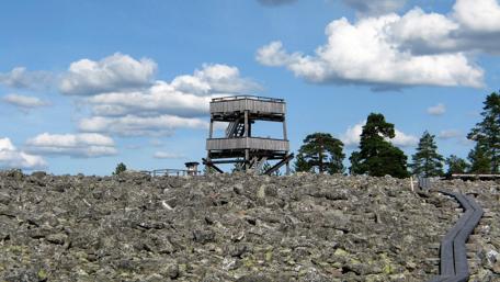 Scenic View of a Watchtower Amidst Rocky Terrain wallpaper
