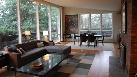 Modern Living Room Embracing Nature's Light wallpaper