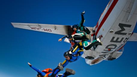 Skydivers Embracing the Thrill of the Sky wallpaper