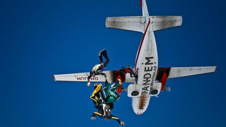 Thrilling Paratroopers in Freefalling Action wallpaper