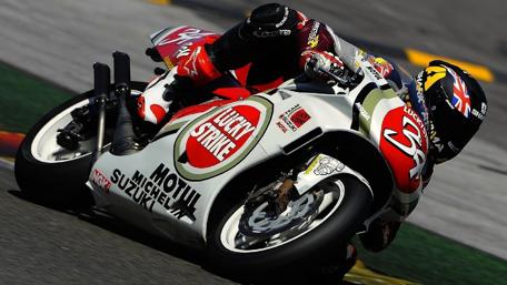 Dynamic Motorcycle Racing Action Wallpaper wallpaper