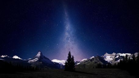 Milky Way Over Serene Mountain Landscape wallpaper