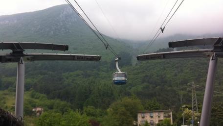 Serene Mountain Cable Car Journey wallpaper