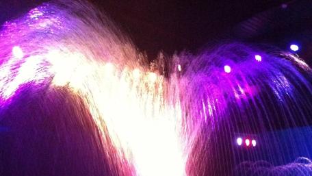 Vibrant Waterfall of Light and Color wallpaper