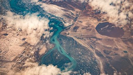 Breathtaking Aerial View of Serene Landscapes in Space wallpaper