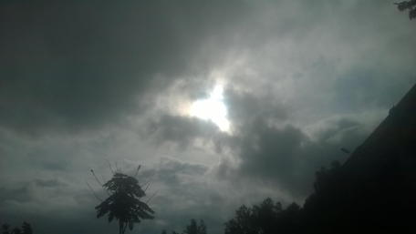 Mysterious Clouds Overhead Showcasing Radiant Light wallpaper