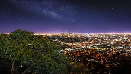 City Lights Meet Starry Skies wallpaper