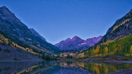 Majestic Mountains Under Starry Sky wallpaper
