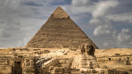 Pyramids of Giza Under Majestic Skies wallpaper